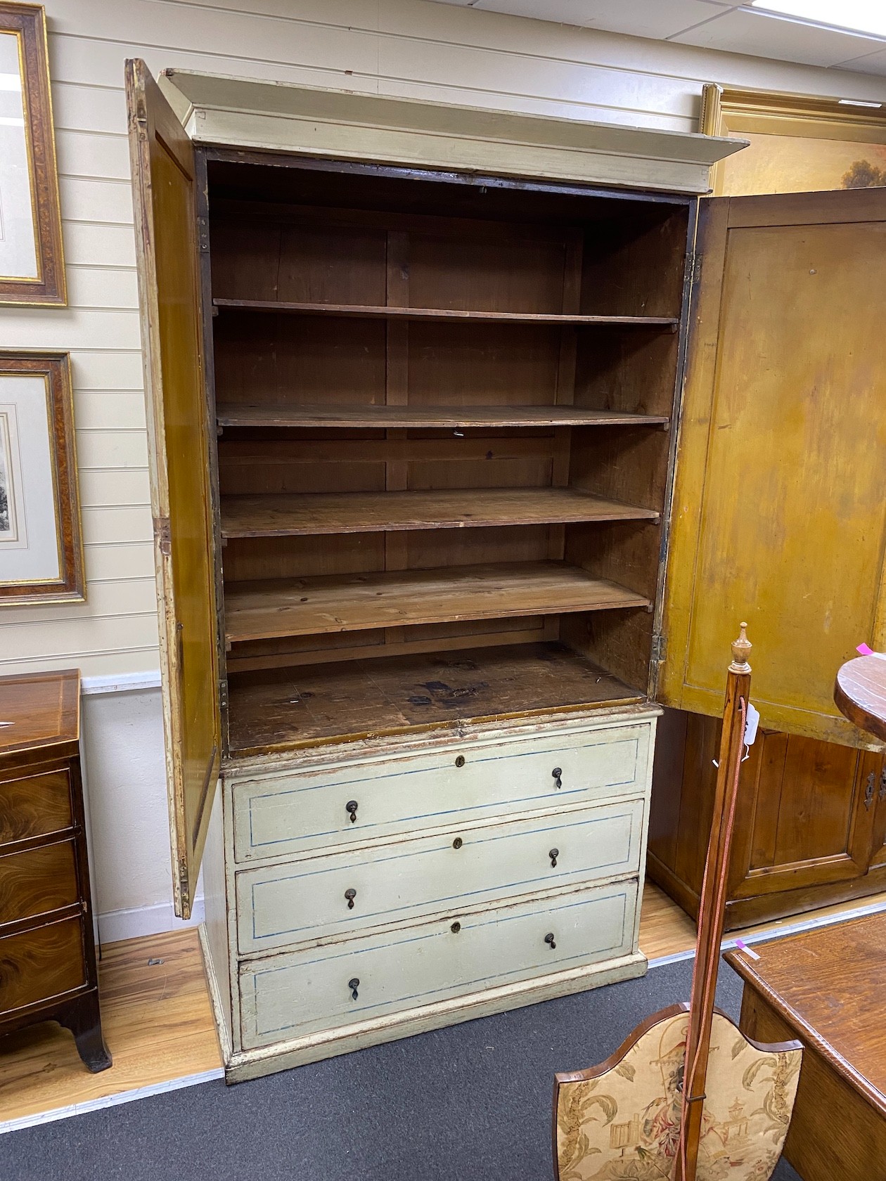 A Victorian painted pine and stencil decorated linen press, width 120cm, depth 57cm, height 225cm